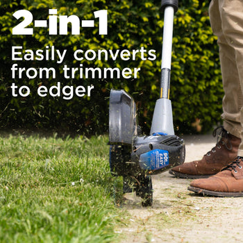 A person uses the edger to cut the grass on the edge of a sidewalk. Text in the upper right corner reads 