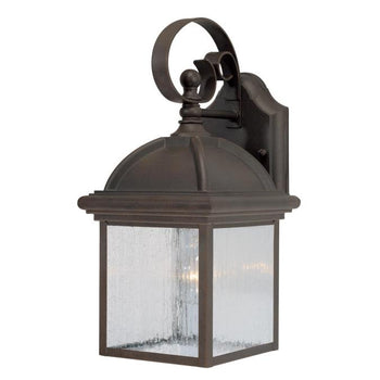 One-Light Exterior Wall Lantern, Textured Rust Patina Finish on Cast Aluminum with Clear Seeded Glass Panels