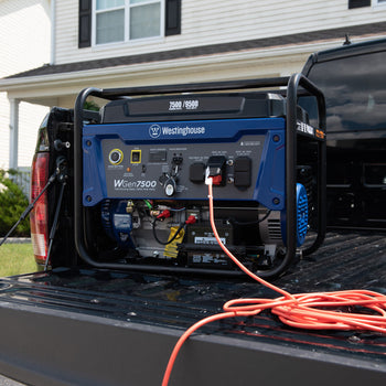 Westinghouse | WGen7500 portable generator sitting in the bed of a pickup truck.