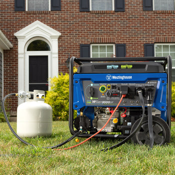Westinghouse | WGen9500DF portable generator connected to a propane tank sitting in grass with a house in the background.